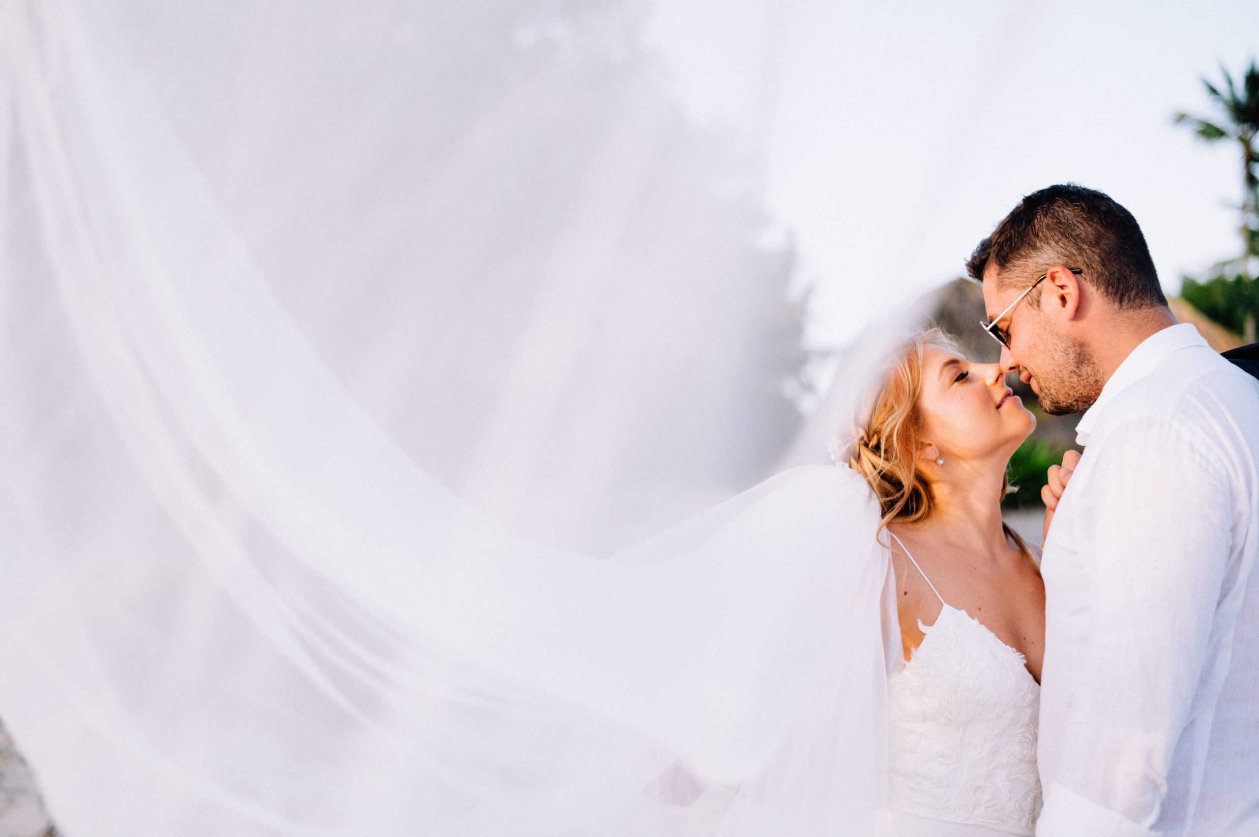 Bride and groom veil portrait on Bayahibe beach