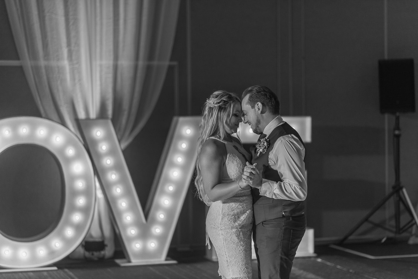 bride and groom dancing at their wedding reception