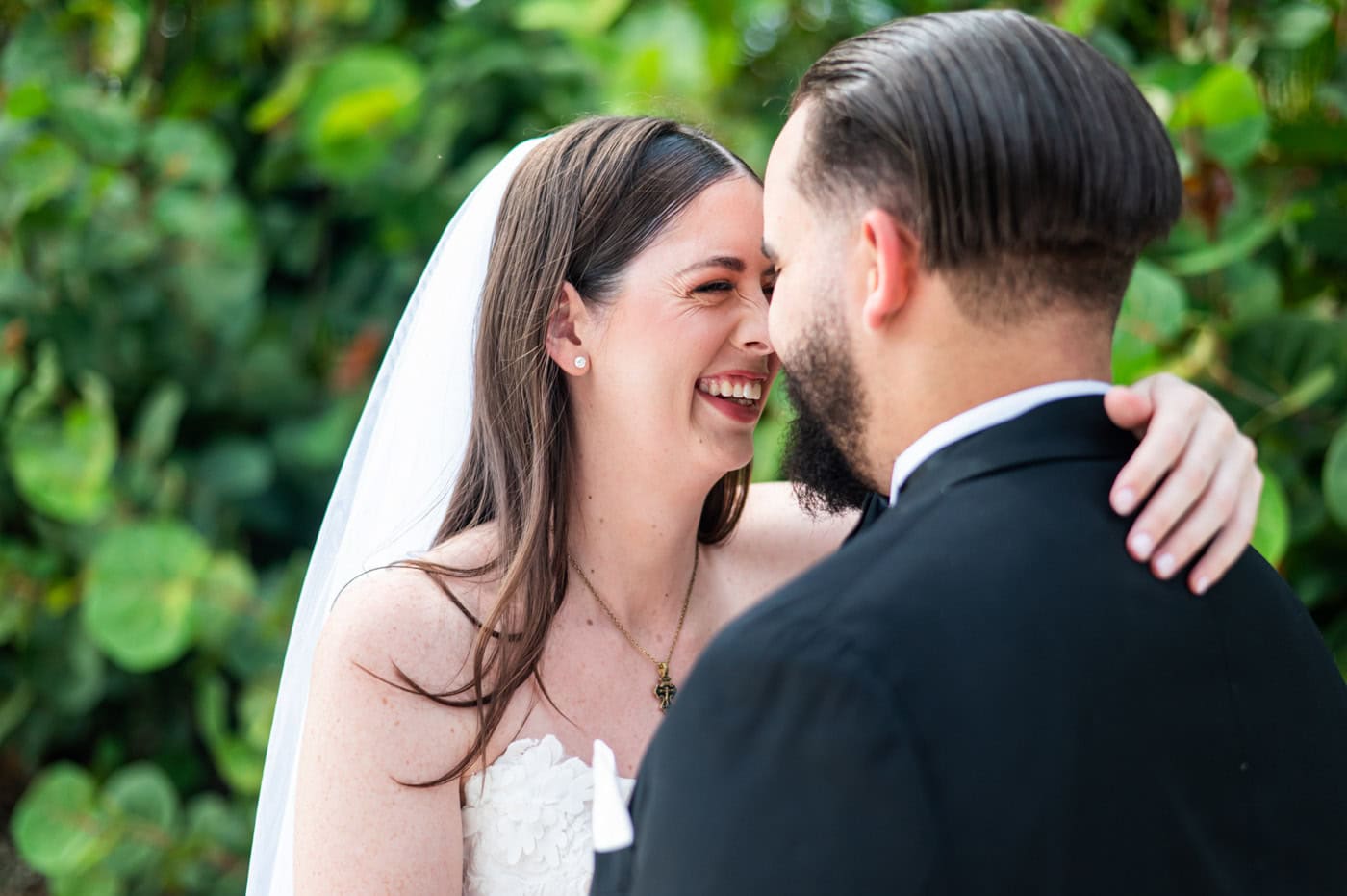 Wedding in Punta Cana with a happy couple smiling close together.