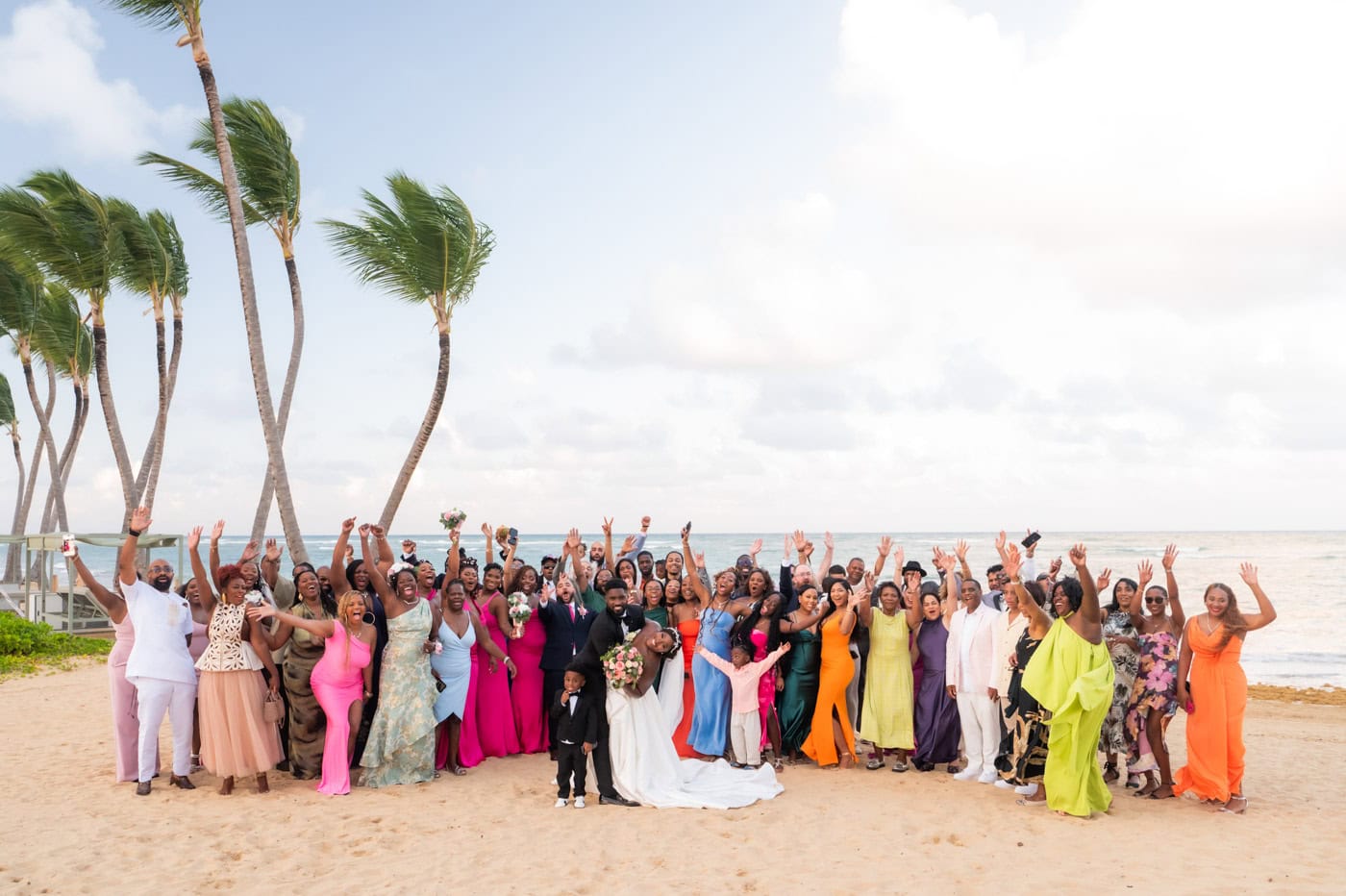 Large group of guests on the beach at a Live Aqua Punta Cana wedding