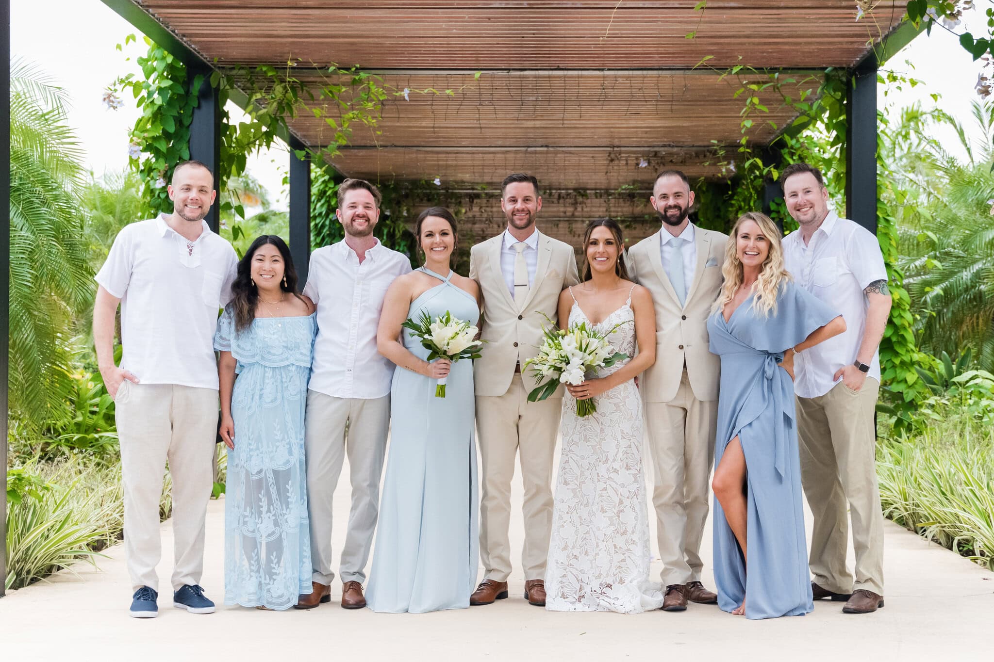 Bride and groom with their wedding party at Live Aqua Punta Cana