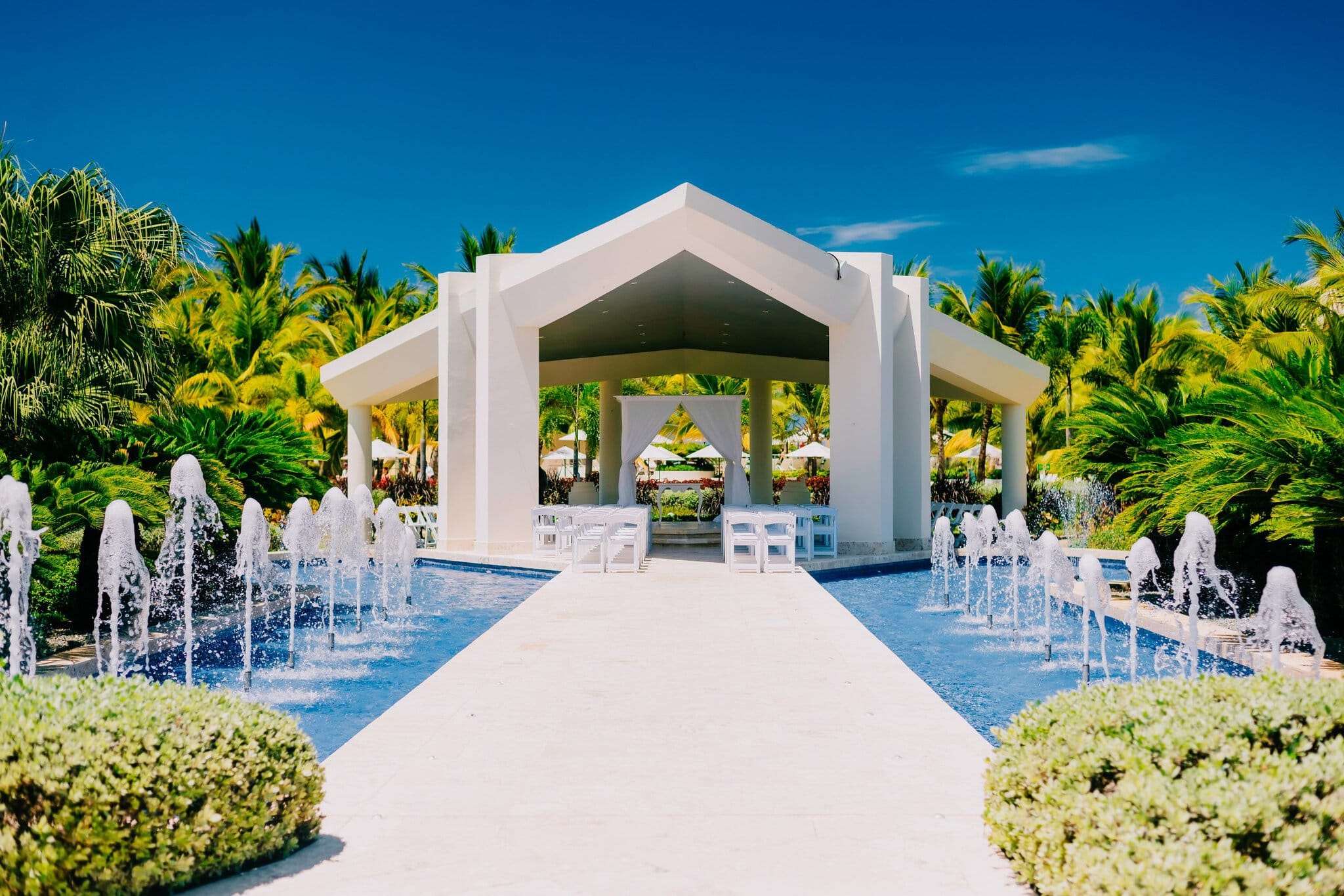 Beach wedding ceremony at a white gazebo in Punta Cana