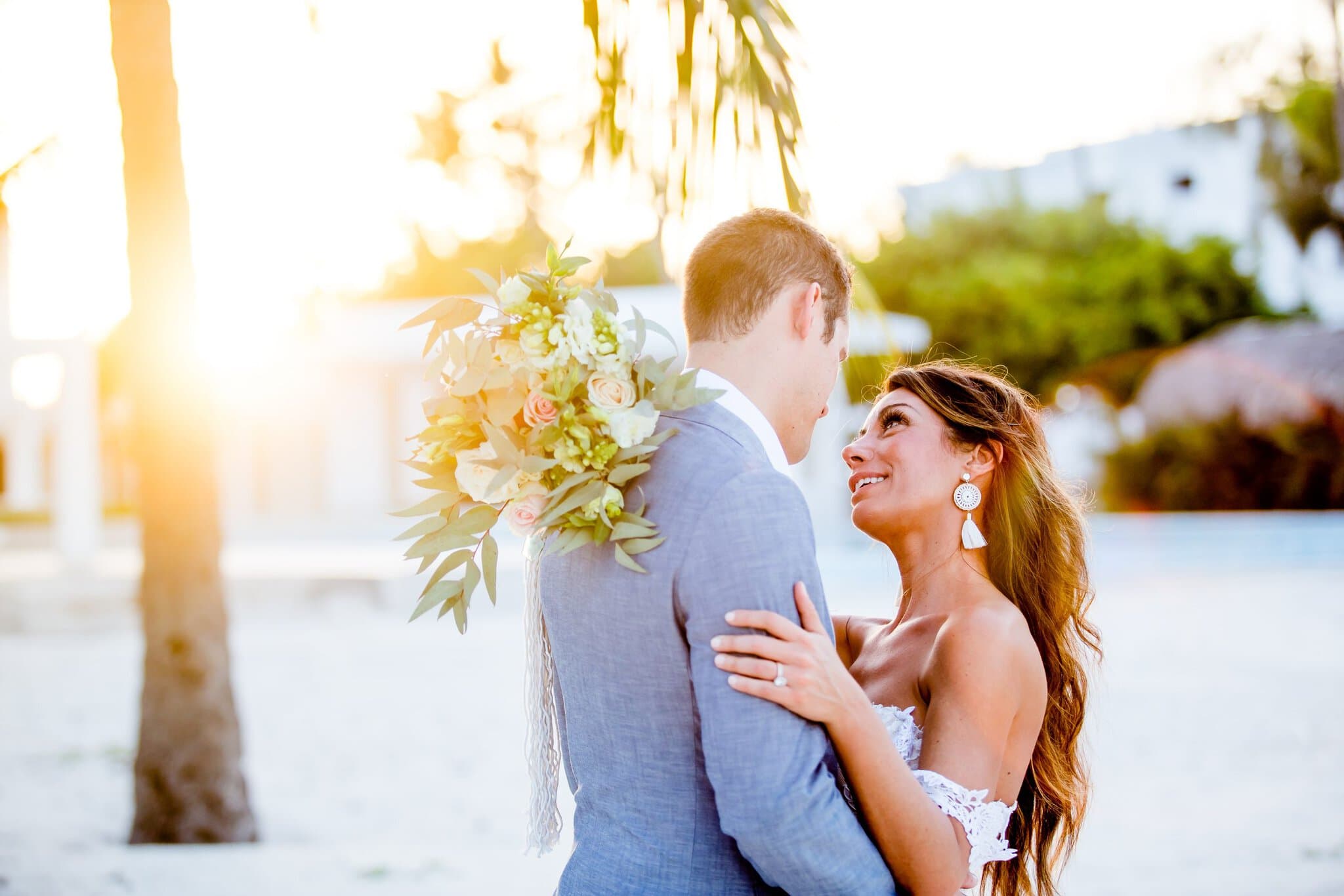 Couple embracing at sunset at their Punta Cana wedding