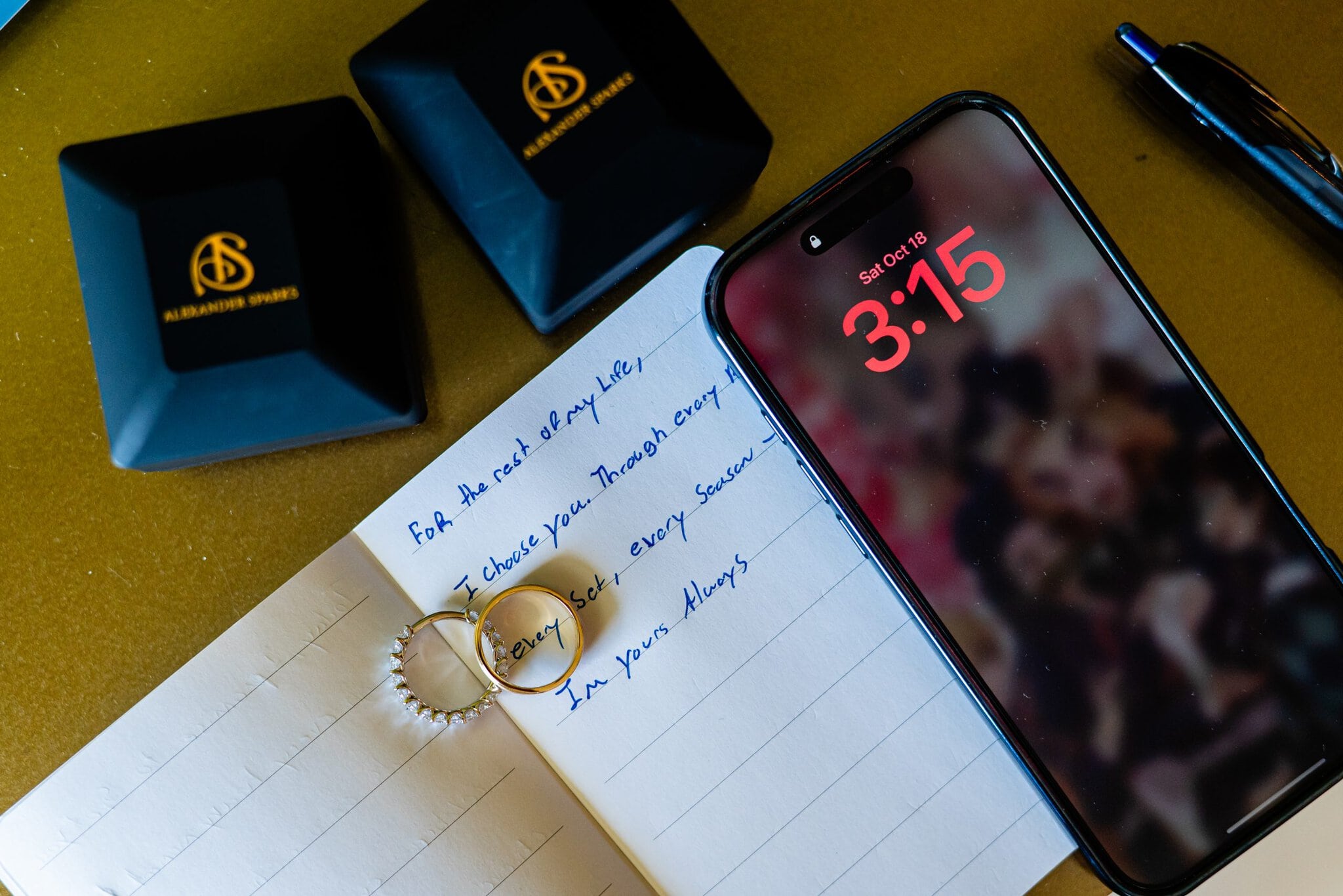 Wedding rings resting on handwritten vows before a Punta Cana wedding