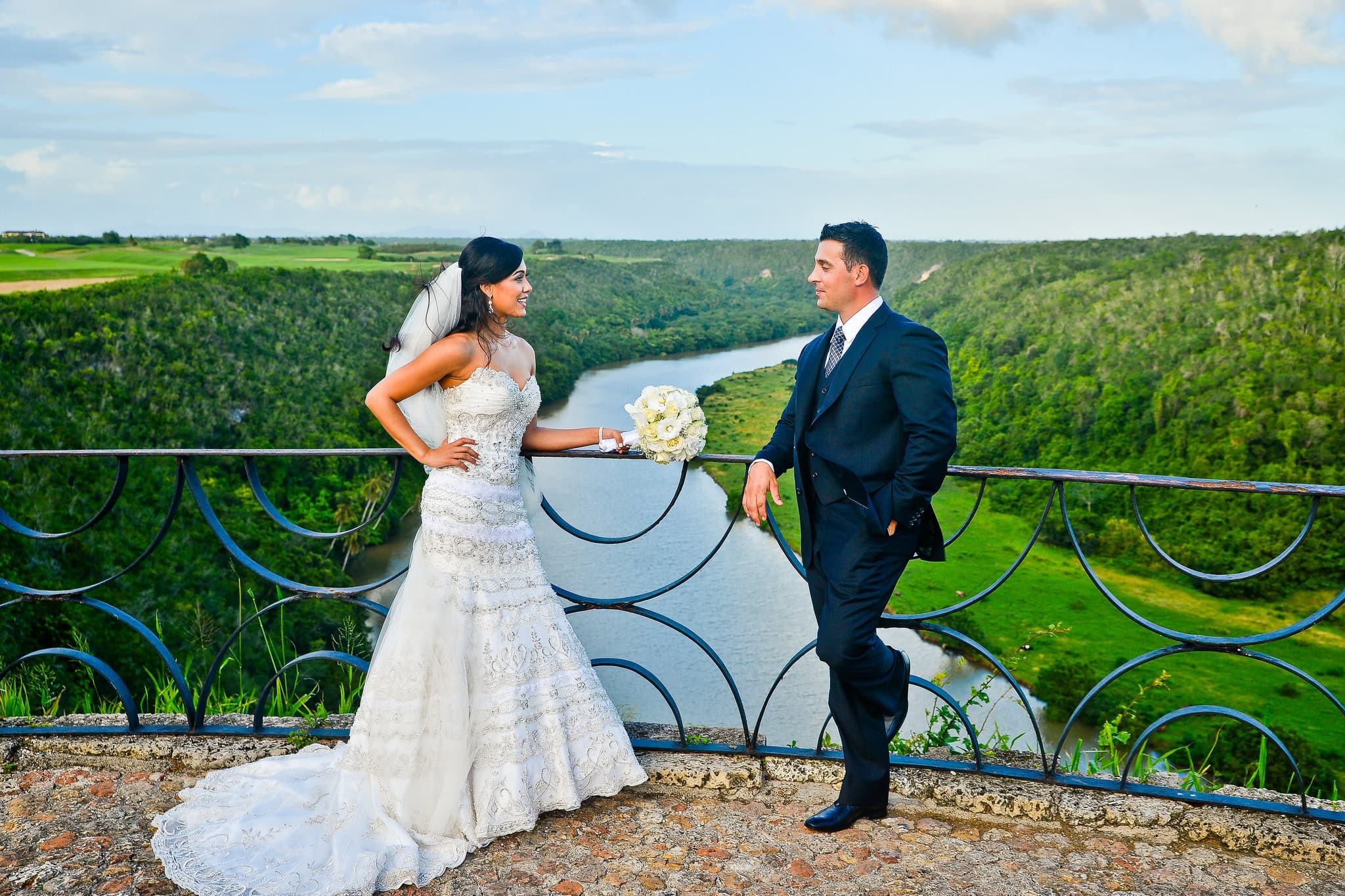 Bride and groom on the Altos de Chavon overlook above the Chavon river at Casa de Campo, La Romana, from Natalie and Stephen wedding film